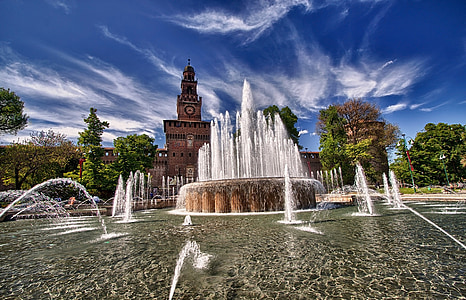 clock tower with water fountain in front thumbnail