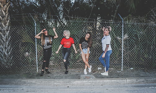 Four Girls Near Fence thumbnail