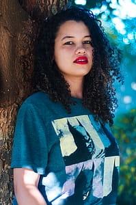 Woman Leaning on Tree thumbnail