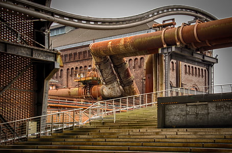 large metal pipes on building roof photo thumbnail