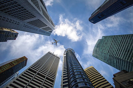 high-rise building under cloudy sky thumbnail
