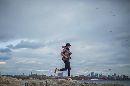 woman running in stone edges thumbnail