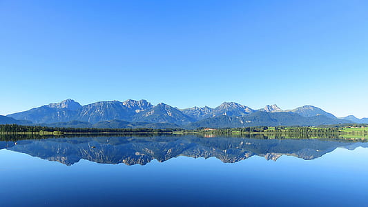 landscape photography of mountains and water thumbnail