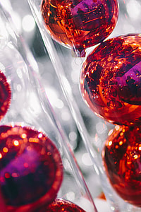 Red Christmas baubles packed in plastic tubes thumbnail