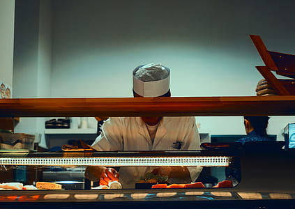 Eastern-style chef fronting display counter thumbnail