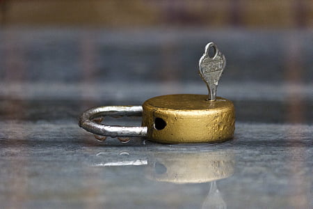gold padlock with key photograph thumbnail