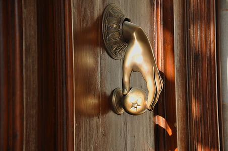 brass-colored arm-designed furniture puller thumbnail