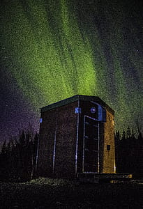 Photo of Wooden Shed Under Northern Lights thumbnail