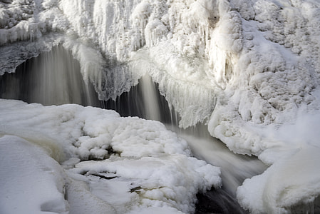 Smooth Water Cascading over frozen Waterfalls at Gooseberry Falls State Park, Minnesota thumbnail