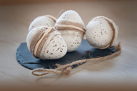 four white eggs on brown table thumbnail