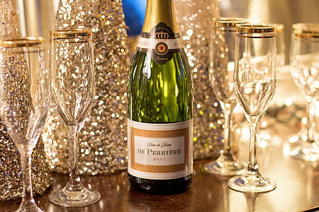 De Perriere bottle beside champagne glasses thumbnail