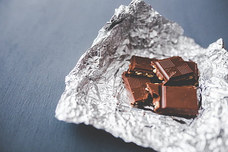 brown chocolates on white aluminum foil thumbnail