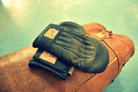pair of black leather gloves thumbnail