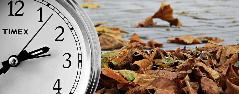 round white analog clock at 2:13 thumbnail