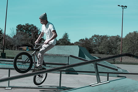 man riding on bike thumbnail