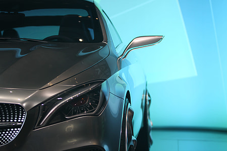 gray Mercedes-Benz coupe concept on white floor tiles thumbnail
