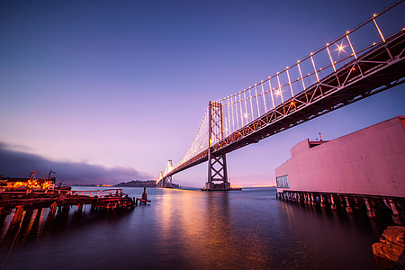Bay Bridge with Treasure Island in San Francisco At Night thumbnail
