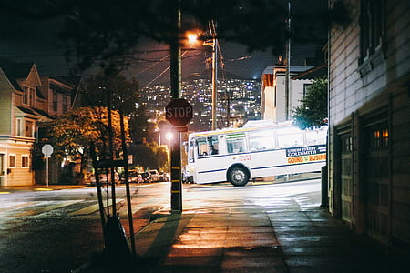 photo of white bus during nighttime thumbnail