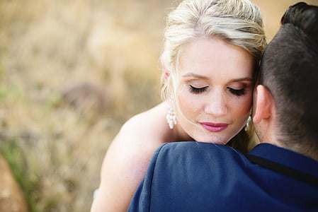 couple hugging on selective focus photo thumbnail