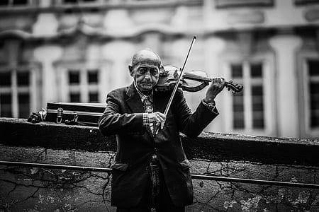 man playing violin thumbnail