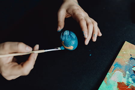 Woman Painting Easter Eggs thumbnail