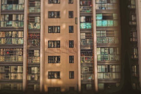 brown and white high-rise building thumbnail