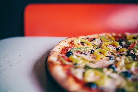 baked pizza on white surface thumbnail