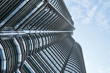 low-angle photo of a clear glass building during day thumbnail