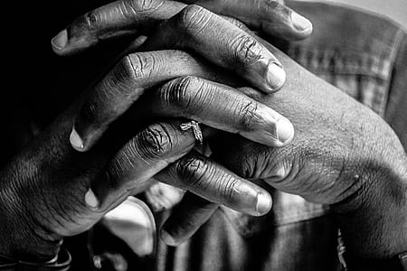 person holding each hands grayscale photo thumbnail