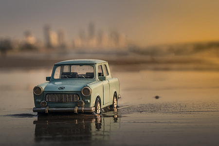A miniature car on the beach thumbnail