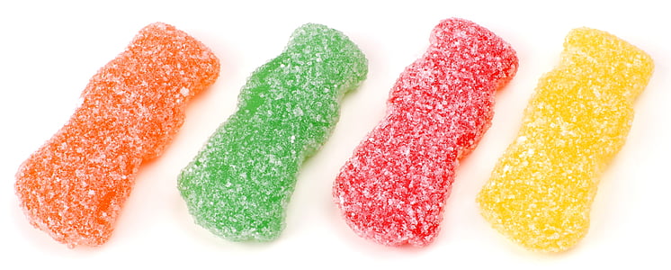 four yellow, green, red, and orange jelly candies thumbnail