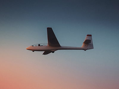 white plane on skies thumbnail