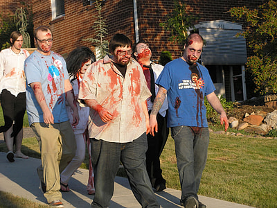 group of people in zombie costumes walking on rad thumbnail