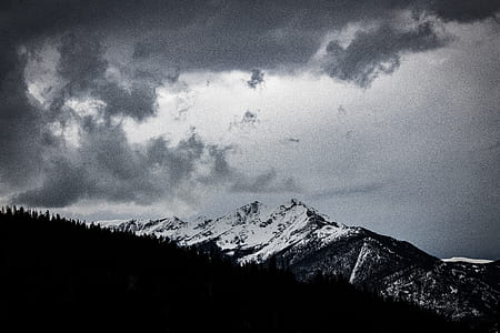 mountains covered with snow grayscale photography thumbnail