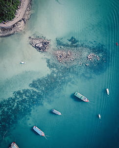 aerial photo of ships on water thumbnail