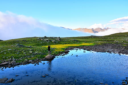 person standing on rock thumbnail