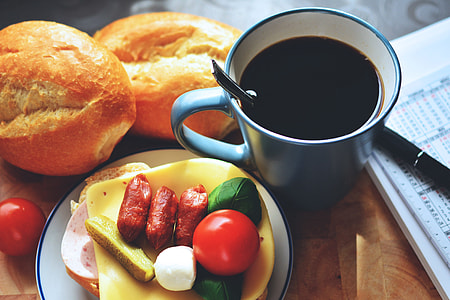 Coffee and breakfast on table thumbnail