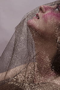 focus photo of woman wearing veil thumbnail