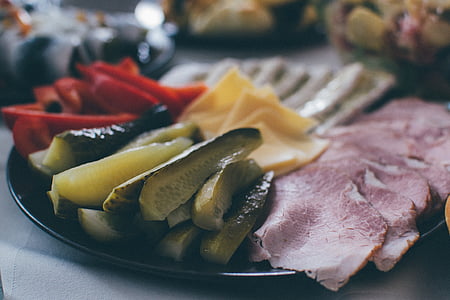 sliced vegetables and meat on plate thumbnail
