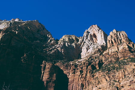 low angle photo of mountain during daytime thumbnail