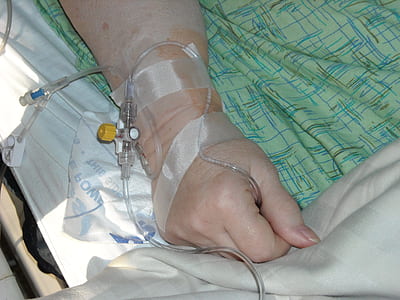 person lying on hospital bed thumbnail