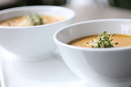 food served on two white bowls thumbnail