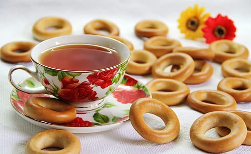 brown donuts on white textile thumbnail