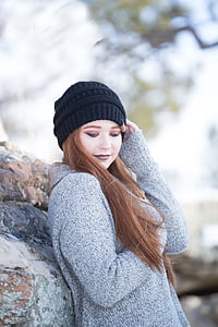 woman wearing gray sweater with black knit cap in focus photography thumbnail