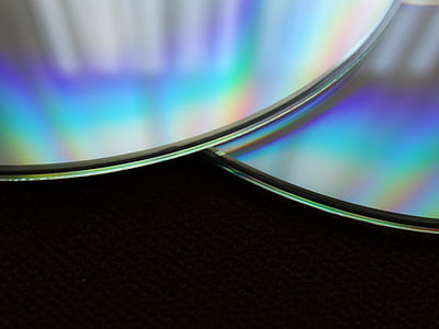 two compact disc in close-up photography thumbnail