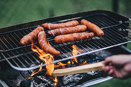 Pork and sausage on the grill thumbnail