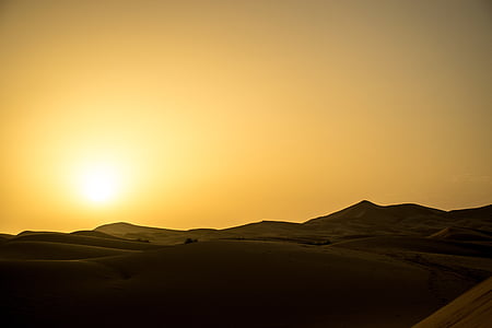 sunset over sand dunes thumbnail