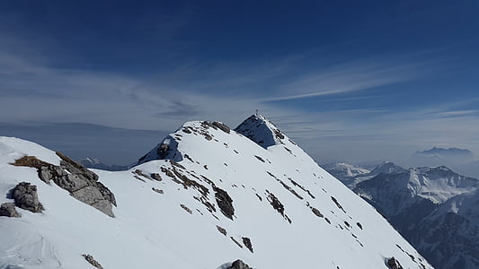 snow covered mountain during daytime thumbnail