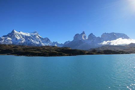 mountain range under blue sky thumbnail