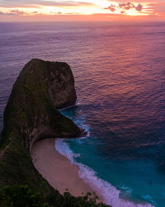aerial photography of beach during sunset thumbnail